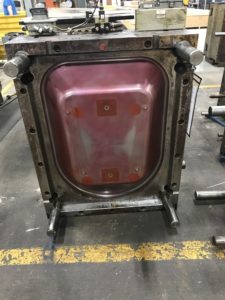 A dirty plastic injection mold